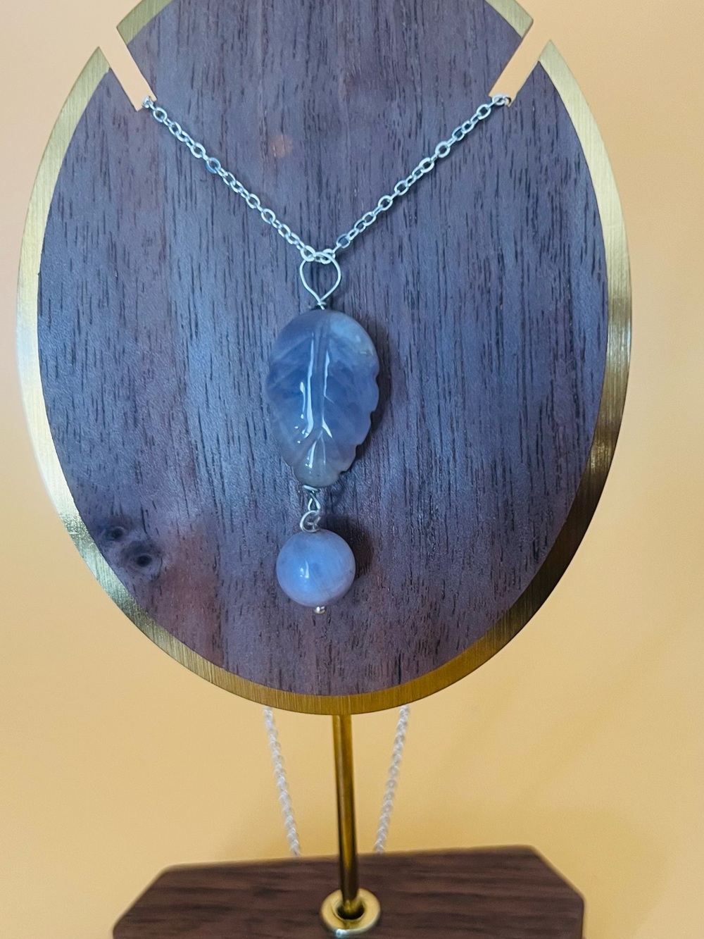 Carved amethyst pendant leaf design set in silver plus matching necklace